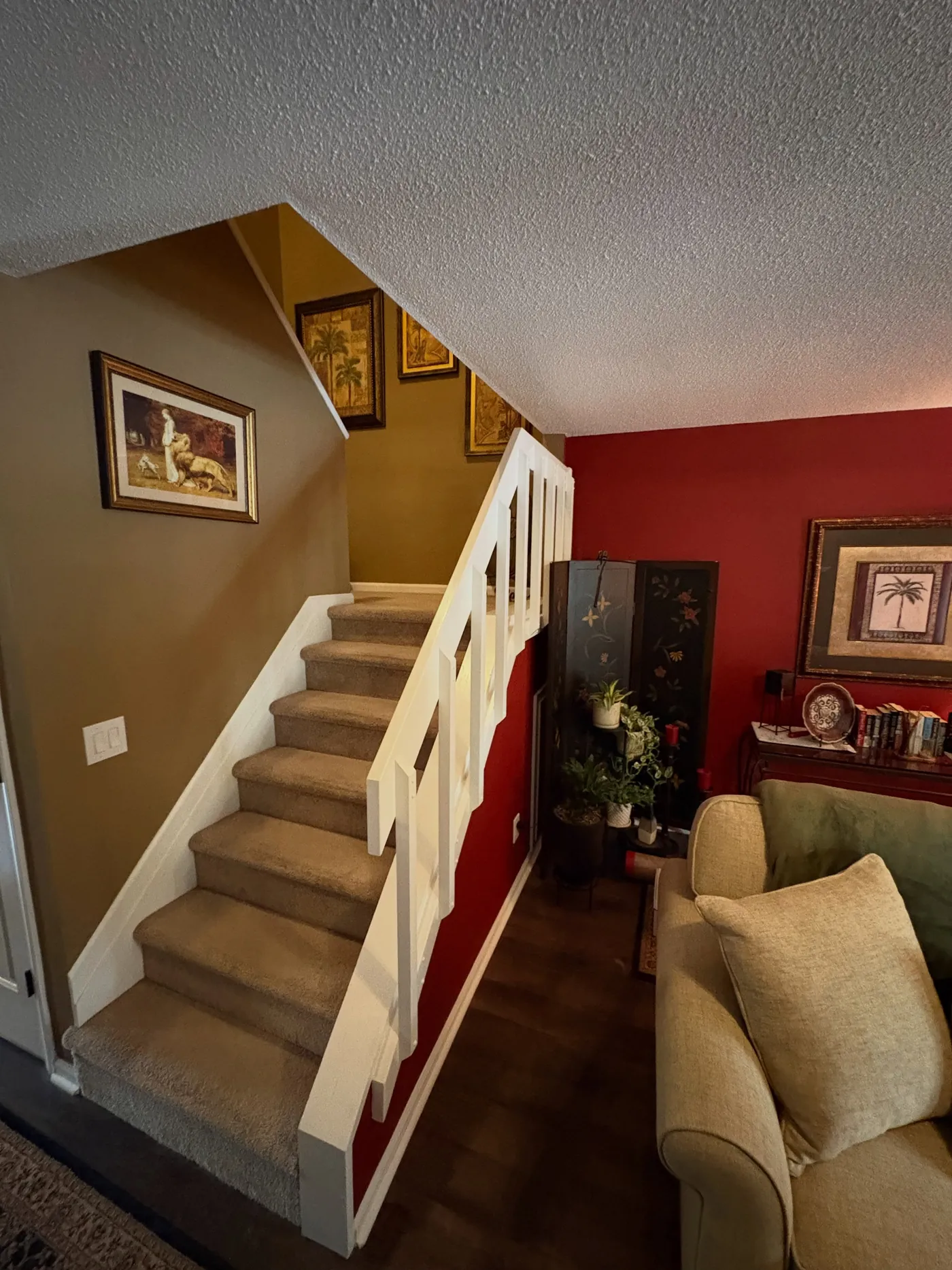 Before: plain painted stair railing with square white balusters